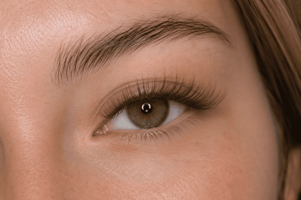 Brown eyelash extensions creating a soft natural look at Lashes On Point Mill Park